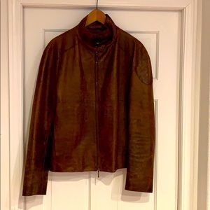 Blake’s brown leather motorcycle jacket